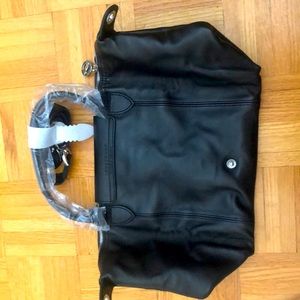 Hi! I’m selling a Longchamp bag.